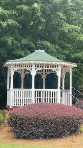 Gazebo with handrails built in Tyler Home pergola and deck look great in back yard.