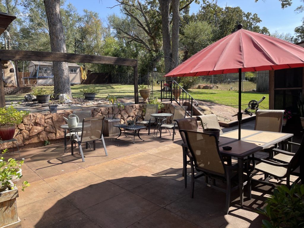 Back yard patio with retaining walls, and gazebo